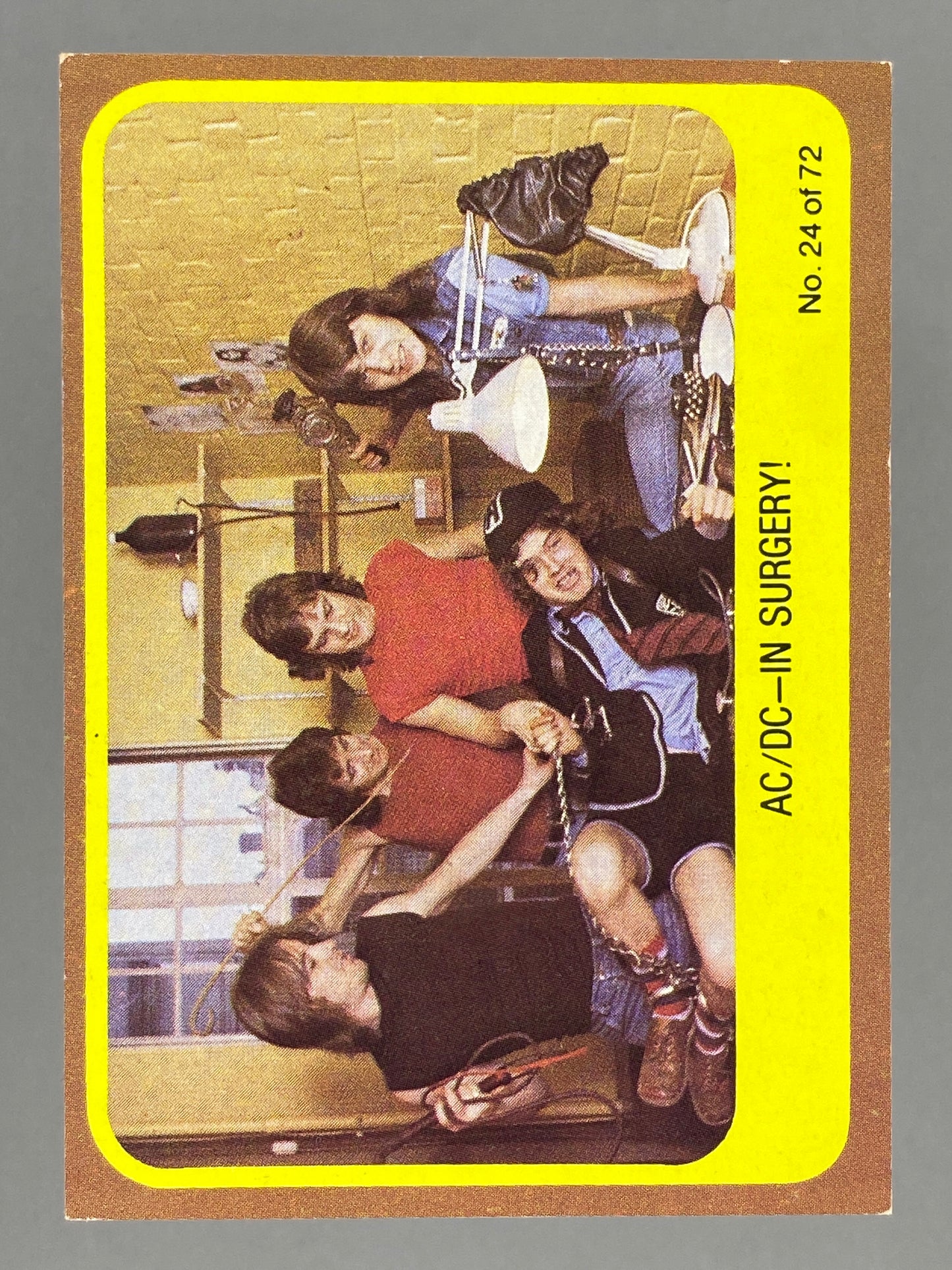 1977 Scanlens Popswops #24 AC/DC In Surgery (Australia) (Music)